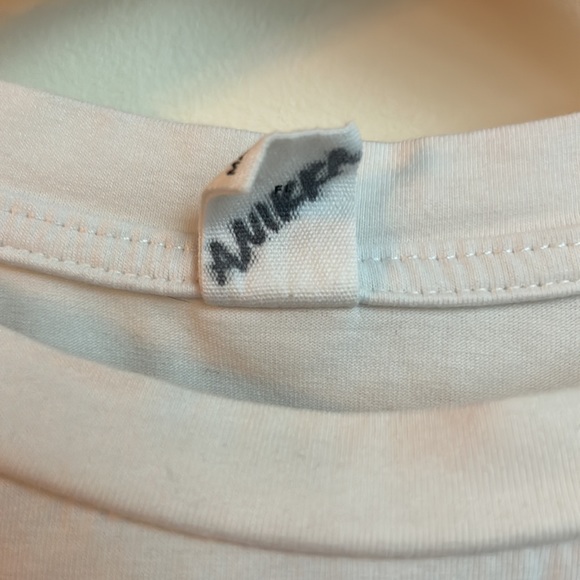 White t shirt with graphic print on the back. - Picture 6 of 6